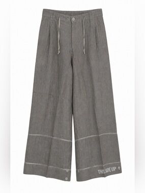 ANNETTE GOERTZ LINEN WIDE LEG PANTS. Sz 41 UNIQUE WITH “THIS SIDE UP” accent.